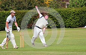 Cricket bowler in action.