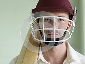 Cricket player In Helmet And With Bat