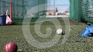 Cricket training equipment sliding close-up