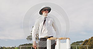 Cricket umpire making signs standing on a cricket pitch