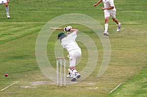 Cricket youth batsmen driving the ball