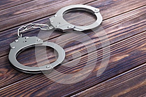 Crime and Law Concept. Metal Handcuffs. 3d Rendering