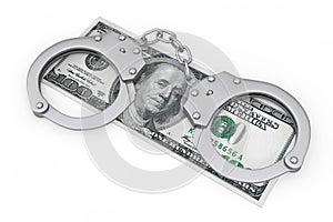 Crime and Law Concept. Metal Handcuffs over Dollars Money Banknote. 3d Rendering