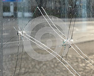 Crime scene bullet holes in the window