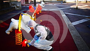 crime scene in a children's playground, where a child was kidnapped. the police present to catalog the evidence