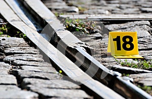 Crime Scene Evidence Marker Near to Rails
