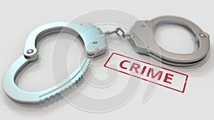 CRIME stamp and handcuffs. Crime and punishment related conceptual 3D rendering