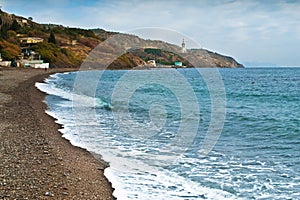 Crimea coastline with a church on a mountain in malorechenskoe