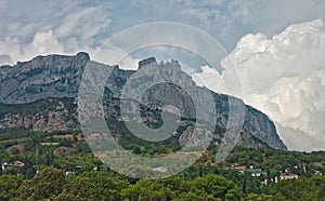 Crimea mountains. Dramatic summer sky with clouds