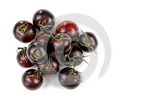 Crimea or Tondo Nero tomatoes Italian Black Cherry. Top view, clipping paths -black cherry tomatoes isolated on white photo