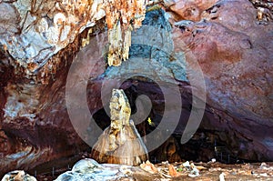 Crimea, Ukraine. Stalactites, stalagmites on the walls of the Emine-Bair-Khosar cave. Template for design. Selective sharpness