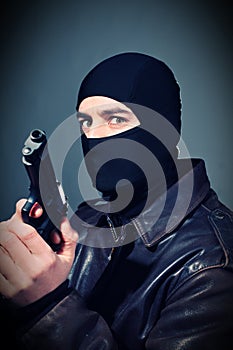 Criminal with gun