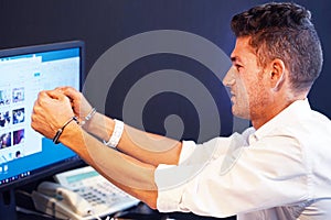 Criminal hacker hands locked in handcuffs. Close-up view