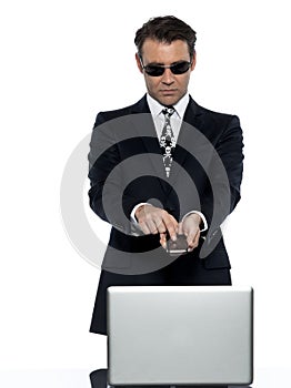 Criminal man computer hacker satisfied on phone