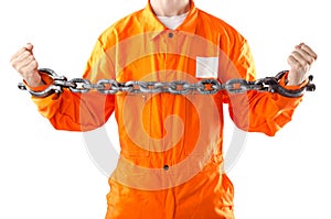 Criminal in orange robe in prison