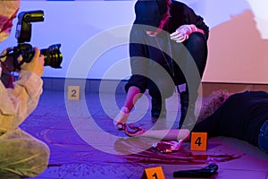 Criminalist working on a crime scene