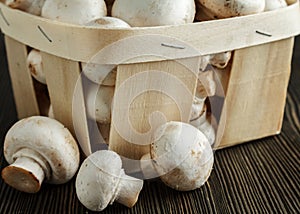 Crimini mushrooms on wood