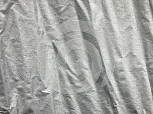 Crinkled white linen fabric in full frame shot