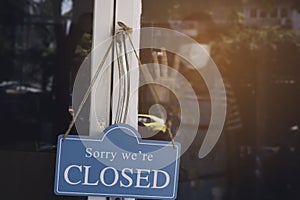 The crisis of coronavirus while the  cafe small business shop and closed sign