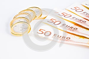 Crisis of eurozone, euro coins on 50-euro banknotes photo
