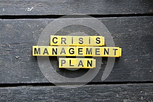 Crisis management plan, inscription on yellow cubes