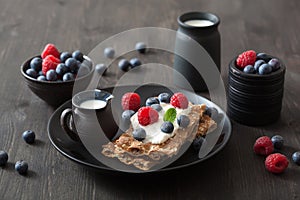 Crisp bread with creme fraiche and berries