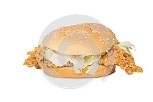 Crisp chicken burger with lettuce isolated on white