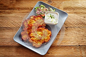 Crisp Fried Potato Rosti Served with Salad and Dip