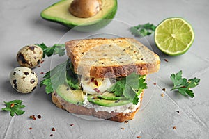 Crisp toast with sliced avocado, cream cheese