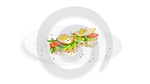 Crispbread sandwich with guacamole, arugula, tomatoes and quail egg isolated on a white background. Bruschetta with