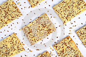 Crispy bread slice with cereals. Healthy cookies with sunflower seeds, flax seeds and sesame seeds.