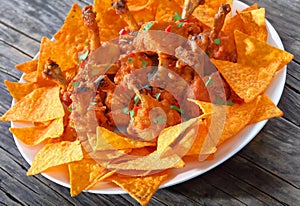 Crispy chicken wing lollipops on plate