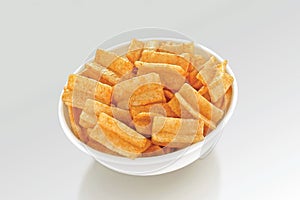 Crispy and crunchy wheat maida Chokadi  Square  Cross shaped  Fryums or Frymus  Street Food  Snacks Pellets photo