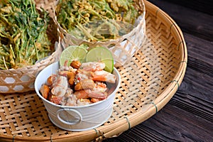 Crispy deep fried morning glory with spicy shrimp salad