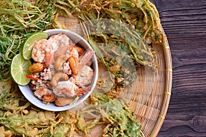 Crispy deep fried morning glory with spicy shrimp salad