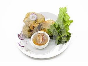 Crispy deep fried Singaras isolated on white background