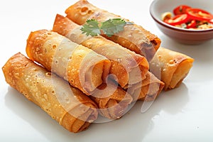 Crispy deep fried spring roll on white background, perfect appetizer