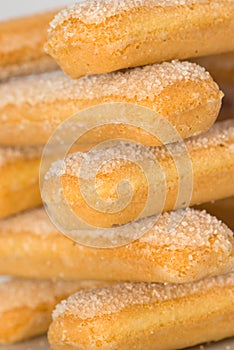 Crispy dry biscuits covered with white sugar