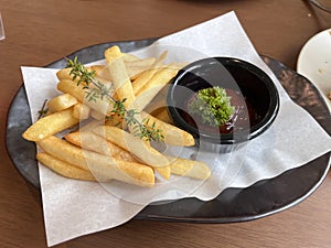 Crispy French Fries with dipping sauce.