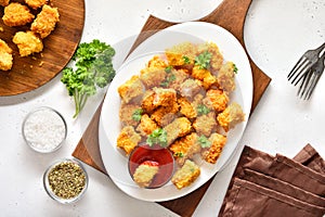 Crispy fried breaded chicken bites on plate