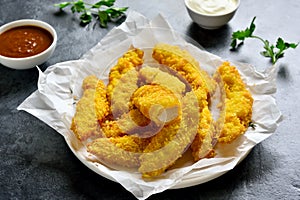 Crispy fried breaded chicken breast strips