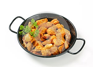 Crispy fried pork greaves