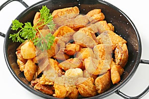 Crispy fried pork greaves