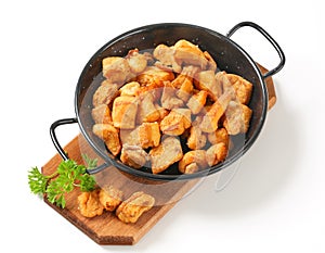 Crispy fried pork greaves