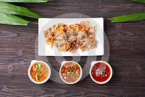 Crispy fried sliced belly pork with spicy sauce