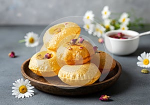 Crispy Golgappa Pani Puri with floral decoration and tamarind sauce photo