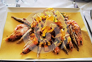 Crispy and hot mixed fried fish dish