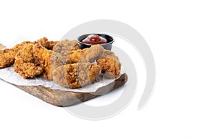 Crispy Kentucky fried chicken on cutting board isolated on white background