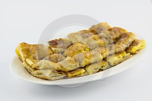 Crispy pancake named -roti-,fr ied bread with butter and egg