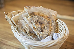 Crispy Pita bread triangles with olive oil and sesame